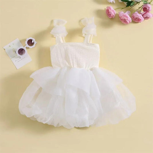 White Sleeveless Ruffled Party Designer Frock For Baby Girl