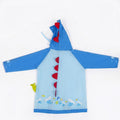 Back view of blue kids raincoat with red dinosaur spikes