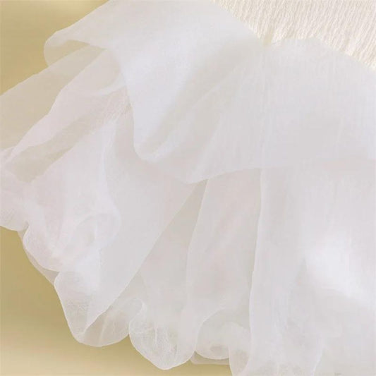 White Sleeveless Ruffled Party Designer Frock For Baby Girl